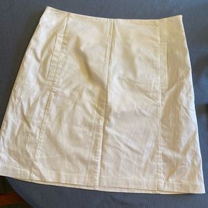 The limited white skirt, size 10